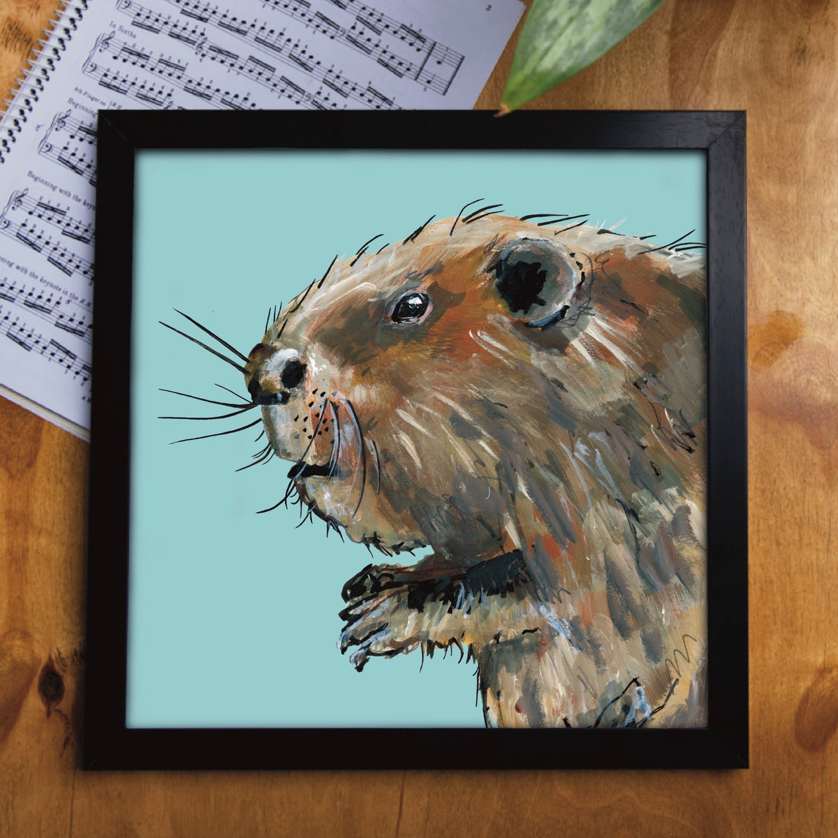 An environmentally friendly fine art card featuring Bushy the Beaver in a black frame.