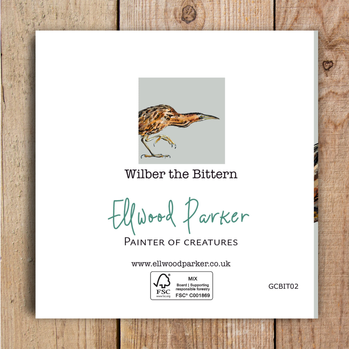 The back of a square wildlife greetings card, featuring a bittern painting by artist Ellwood Parker.
